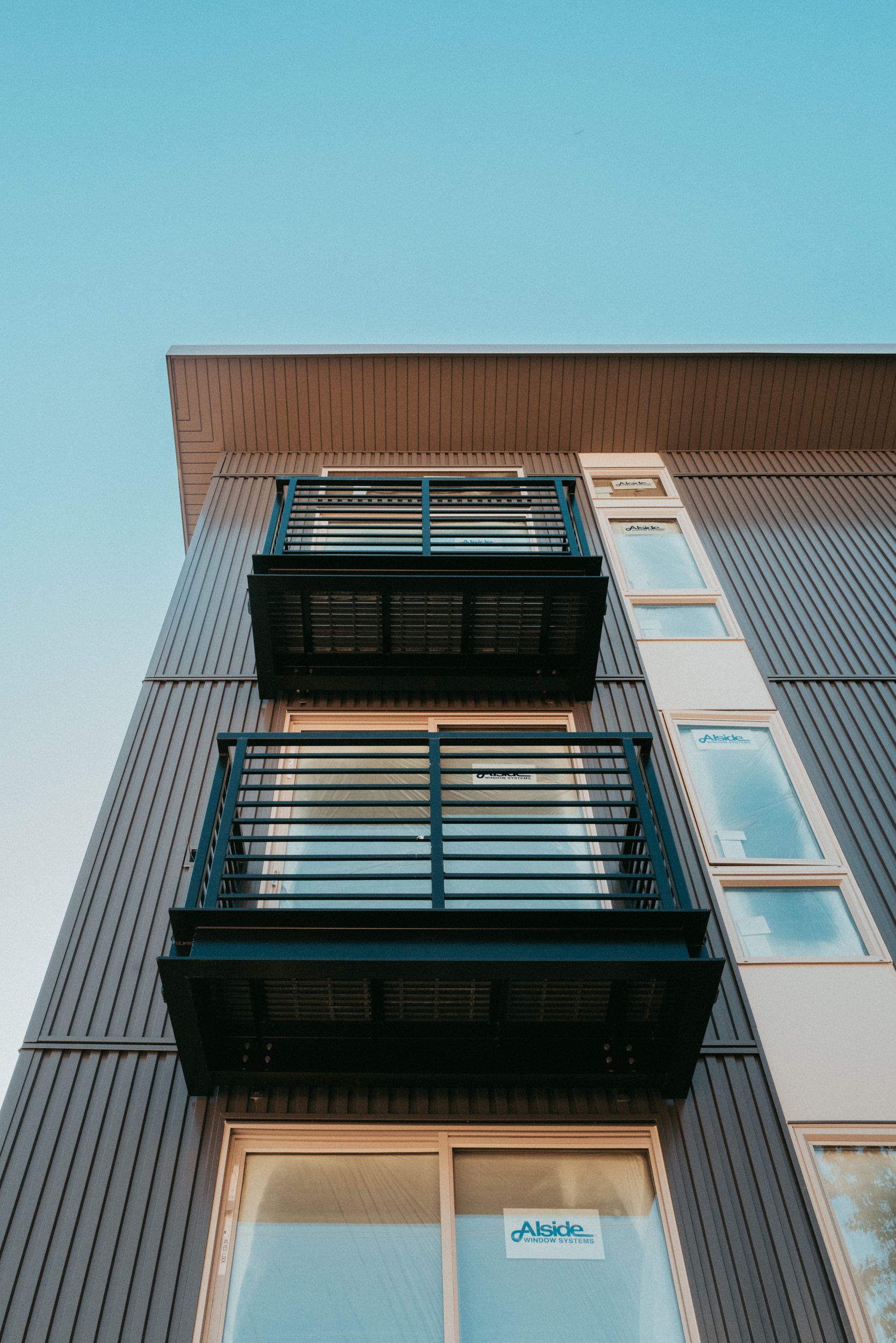 Metal panels framing balconies