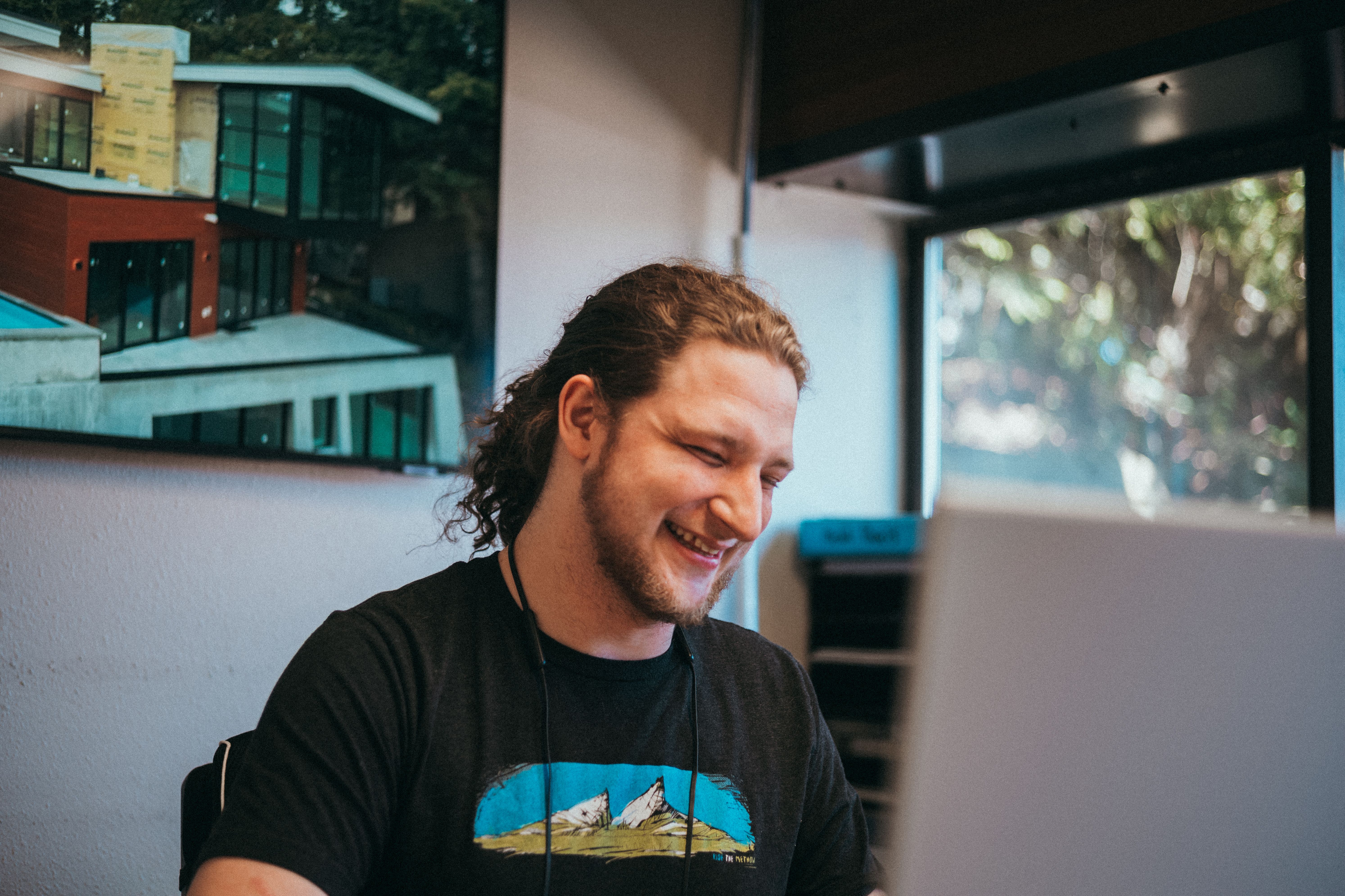 A Seattle Metals team member at a desk in the office